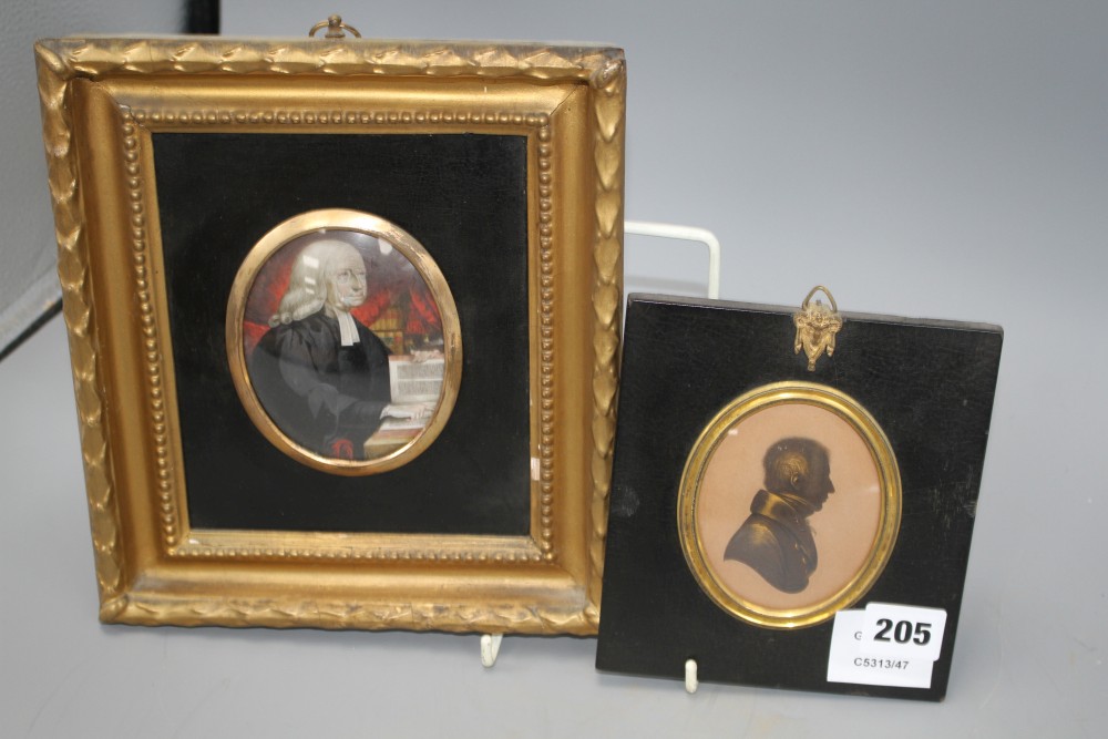 A Victorian oil on ivory miniature of a clergyman & a gilt silhouette of a gentleman by Field